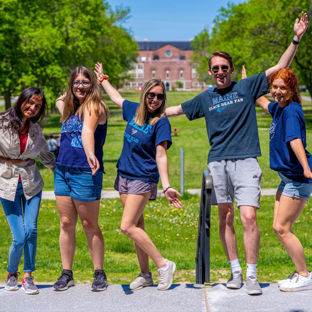 A photo of Team Maine members on the steps of UMaine's library