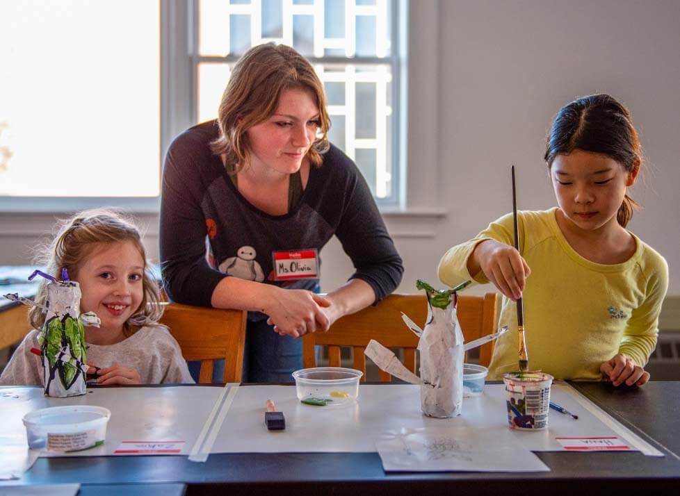 A photo of a woman with two children