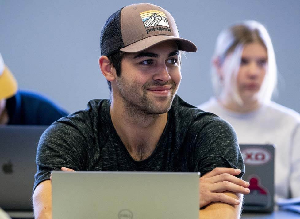 A photo of a student in a classroom