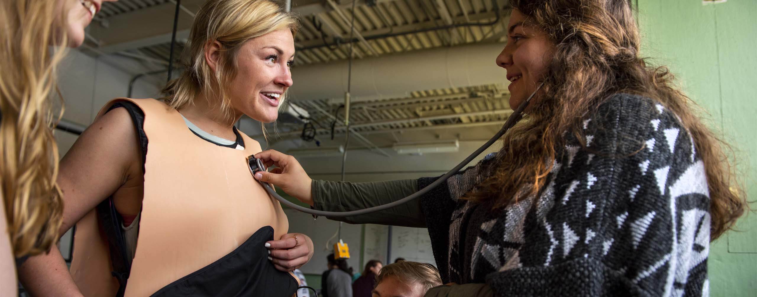 A photo of students working on their capstone project