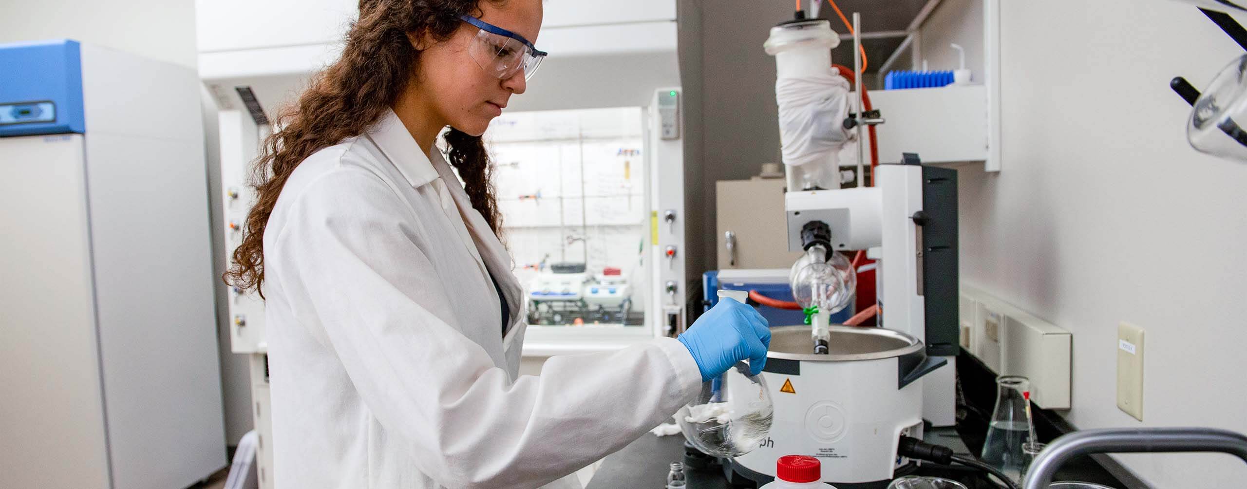 A photo of a student in a lab