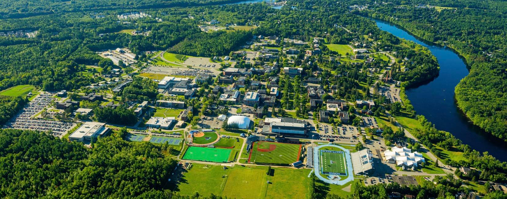 An aerial photo of UMaine's campus in summer